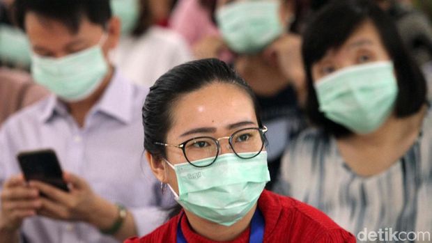 Ilustrasi orang menggunakan masker