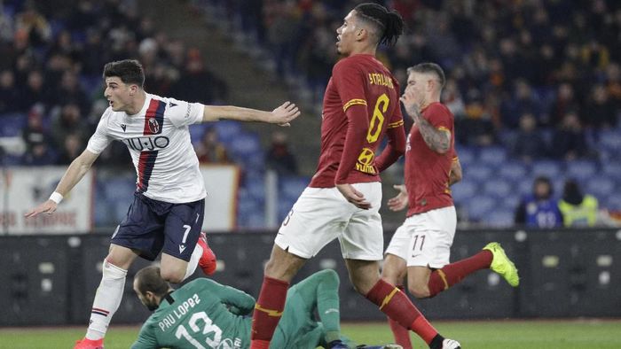 Roma vs Bologna Bolognas Riccardo Orsolini, left, celebrates after scoring during the Italian Serie A soccer match between Roma and Bologna at Romes Olympic stadium, Friday, Feb. 7, 2020. (AP Photo/Gregorio Borgia)