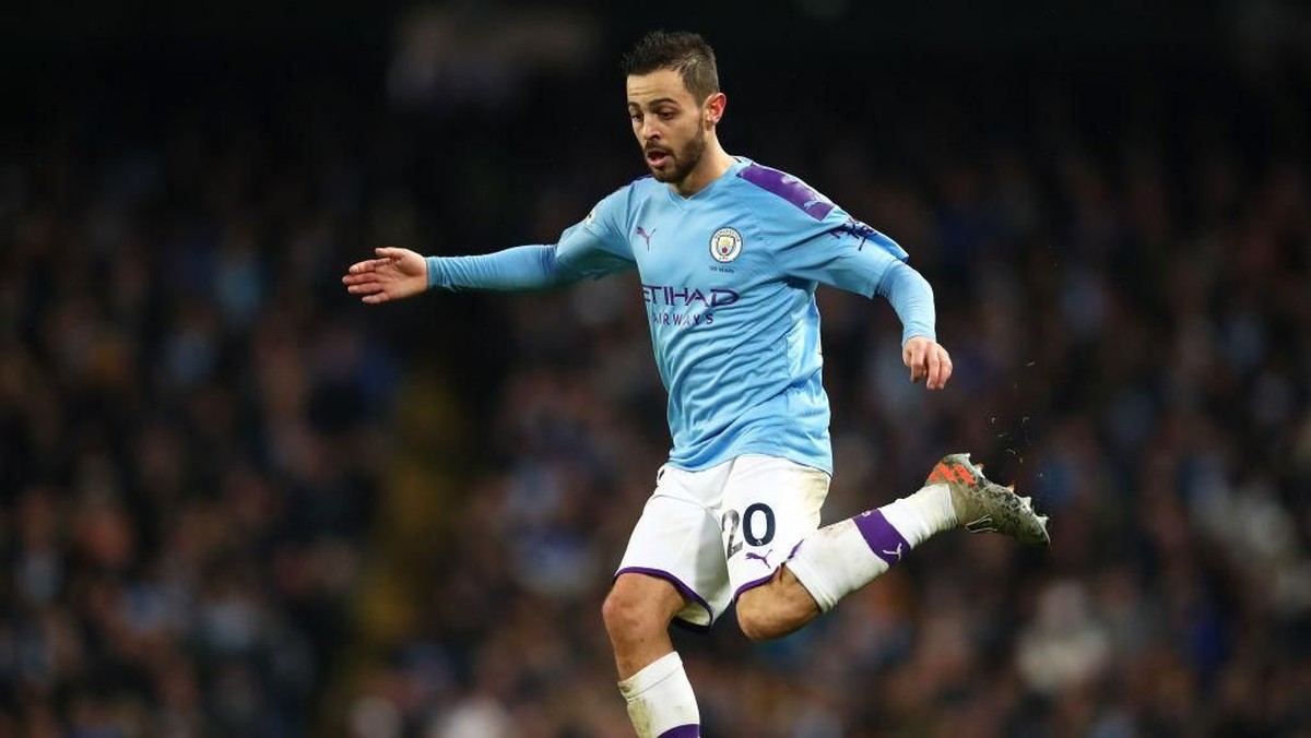 Terlalu lama lockdown, gelandang Manchester City Bernardo Silva sampai lupa pertandingan terakhir yang ia mainkan (Foto: Clive Brunskill/Getty Images)