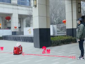 Takut Virus Corona, Begini Cara Restoran di China Kirim Makanan Tanpa Kontak Langsung