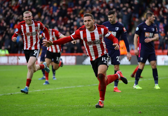 SHEFFIELD, ENGLAND - FEBRUARY 09: Billy Sharp of Sheffield United celebrates scoring his teams first goal during the Premier League match between Sheffield United and AFC Bournemouth  at Bramall Lane on February 09, 2020 in Sheffield, United Kingdom. (Photo by Richard Heathcote/Getty Images)
