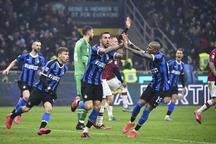 Inter Milans Matias Vecino celebrates after scoring his sides second goal during the Serie A soccer match between Inter Milan and AC Milan at the San Siro Stadium, in Milan, Italy, Sunday, Feb. 9, 2020. (Massimo Paolone/Lapresse via AP)