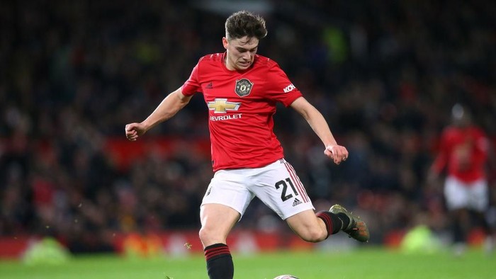 MANCHESTER, ENGLAND - JANUARY 15:  Daniel James of Manchester United shoots during the FA Cup Third Round Replay match between Manchester United and Wolverhampton Wanderers at Old Trafford on January 15, 2020 in Manchester, England. (Photo by Alex Livesey/Getty Images)
