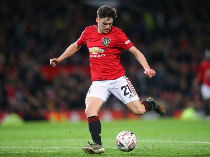 MANCHESTER, ENGLAND - JANUARY 15:  Daniel James of Manchester United shoots during the FA Cup Third Round Replay match between Manchester United and Wolverhampton Wanderers at Old Trafford on January 15, 2020 in Manchester, England. (Photo by Alex Livesey/Getty Images)