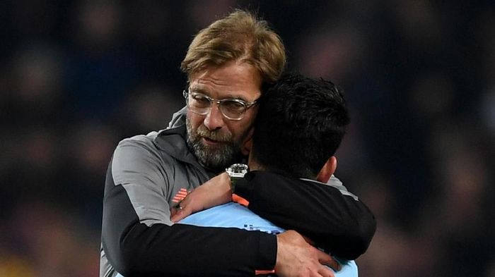 Guendogan Klopp Manchester City v Liverpool - UEFA Champions League Quarter Final Second Leg
MANCHESTER, ENGLAND - APRIL 10: Jurgen Klopp, Manager of Liverpool embraces Ilkay Gundogan of Manchester City after the UEFA Champions League Quarter Final Second Leg match between Manchester City and Liverpool at Etihad Stadium on April 10, 2018 in Manchester, England. (Photo by Shaun Botterill/Getty Images,)