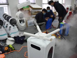 China Ciptakan Robot Khusus Untuk Kurangi Penularan Virus Corona
