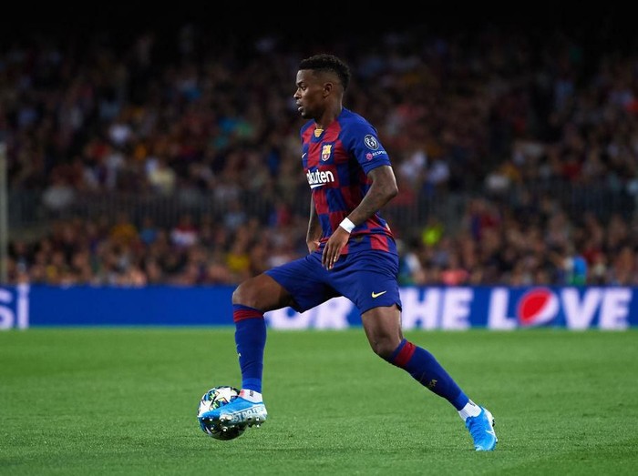 BARCELONA, SPAIN - OCTOBER 02: Nelson Semedo of FC Barcelona conducts the ball during the UEFA Champions League group F match between FC Barcelona and Inter at Camp Nou on October 02, 2019 in Barcelona, Spain. (Photo by Alex Caparros/Getty Images)