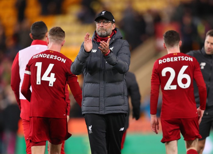 NORWICH, ENGLAND - FEBRUARY 15: Sadio Mane and Jordan Henderson of Liverpool celebrate following their sides victory in the Premier League match between Norwich City and Liverpool FC at Carrow Road on February 15, 2020 in Norwich, United Kingdom. (Photo by Catherine Ivill/Getty Images)