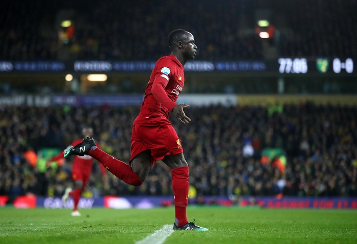 NORWICH, ENGLAND - FEBRUARY 15: Sadio Mane of Liverpool celebrates after scoring his teams first goal during the Premier League match between Norwich City and Liverpool FC at Carrow Road on February 15, 2020 in Norwich, United Kingdom. (Photo by Julian Finney/Getty Images)