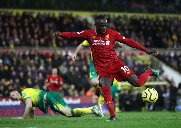 NORWICH, ENGLAND - FEBRUARY 15: Sadio Mane of Liverpool scores his teams first goal during the Premier League match between Norwich City and Liverpool FC at Carrow Road on February 15, 2020 in Norwich, United Kingdom. (Photo by Julian Finney/Getty Images)