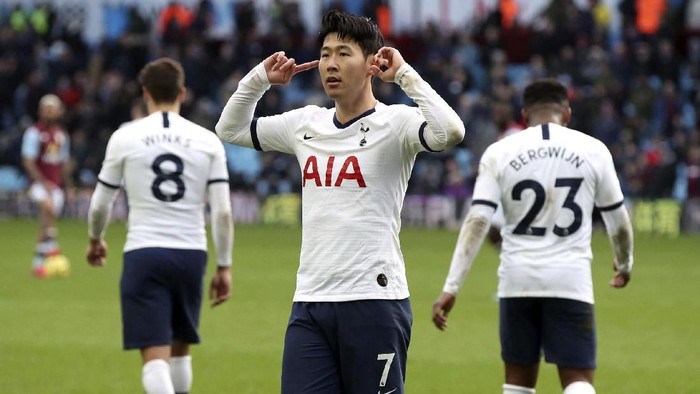 Tottenham Hotspurs Son Heung-min celebrates scoring against Aston Villa during the English Premier League soccer match at Villa Park, Birmingham, England, Sunday Feb. 16, 2020. (Nick Potts/PA via AP)