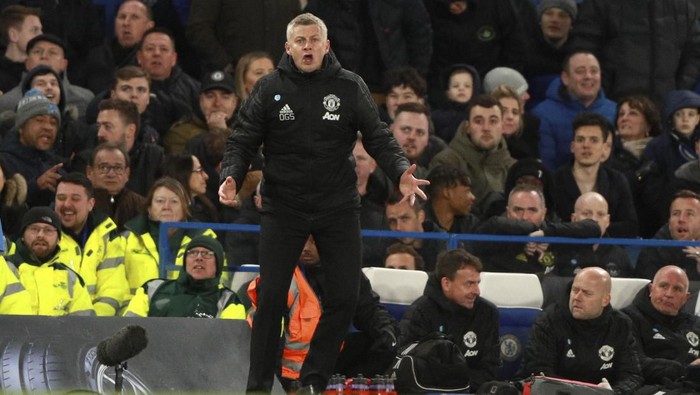 Manchester Uniteds manager Ole Gunnar Solskjaer reacts during the English Premier League soccer match between Chelsea and Manchester United at Stamford Bridge in London, England, Monday, Feb. 17, 2020. (AP Photo/Ian Walton)