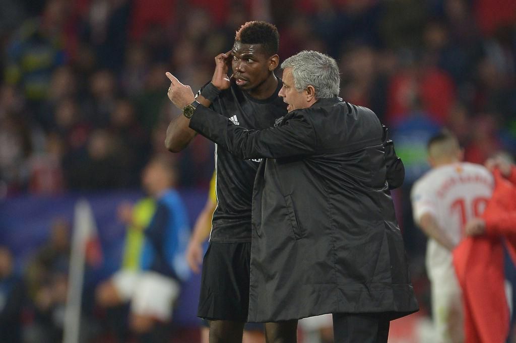 SEVILLE, SPAIN - FEBRUARY 21:  Jose Mourinho, Manager of Manchester United speaks to Paul Pogba during the UEFA Champions League Round of 16 First Leg match between Sevilla FC and Manchester United at Estadio Ramon Sanchez Pizjuan on February 21, 2018 in Seville, Spain.  (Photo by Aitor Alcalde/Getty Images)