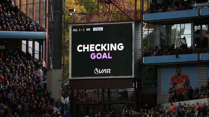 BIRMINGHAM, ENGLAND - OCTOBER 19: A VAR goal check is performed and shown on the giant screen during the Premier League match between Aston Villa and Brighton & Hove Albion at Villa Park on October 19, 2019 in Birmingham, United Kingdom. (Photo by Marc Atkins/Getty Images)