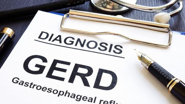 Gastroesophageal reflux disease GERD on a clinic desk.
