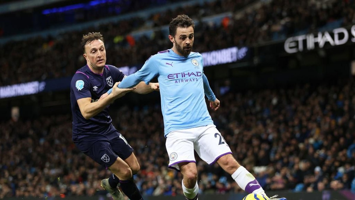Manchester City menang 2-0 atas West Ham United. (Foto: Clive Brunskill/Getty Images)