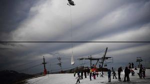 Momen Resor Ski Eropa Gotong Salju dari Pucuk Gunung