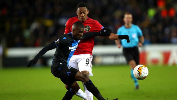 Manchester United BRUGGE, BELGIUM - FEBRUARY 20: Anthony Martial of Manchester United is tackled by Clinton Mata of Club Brugge during the UEFA Europa League round of 32 first leg match between Club Brugge and Manchester United at Jan Breydel Stadium on February 20, 2020 in Brugge, Belgium. (Photo by Dean Mouhtaropoulos/Getty Images)