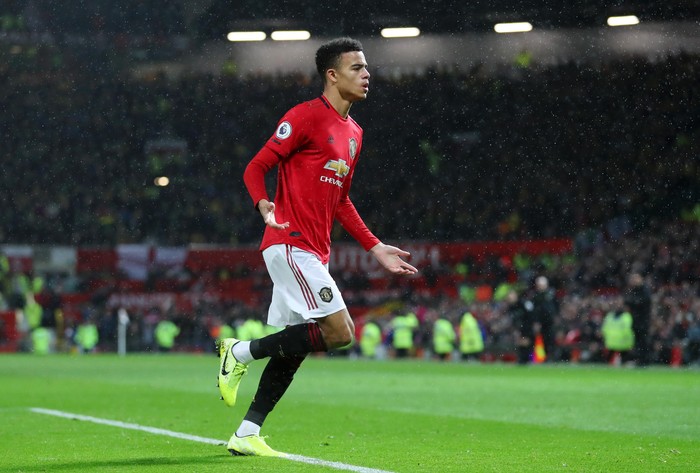 MANCHESTER, ENGLAND - JANUARY 11: Mason Greenwood of Manchester United celebrates after scoring his teams fourth goal during the Premier League match between Manchester United and Norwich City at Old Trafford on January 11, 2020 in Manchester, United Kingdom. (Photo by Catherine Ivill/Getty Images)