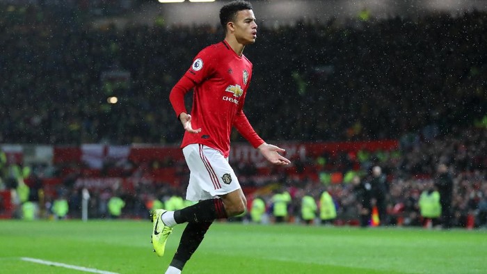 MANCHESTER, ENGLAND - JANUARY 11: Mason Greenwood of Manchester United celebrates after scoring his teams fourth goal during the Premier League match between Manchester United and Norwich City at Old Trafford on January 11, 2020 in Manchester, United Kingdom. (Photo by Catherine Ivill/Getty Images)