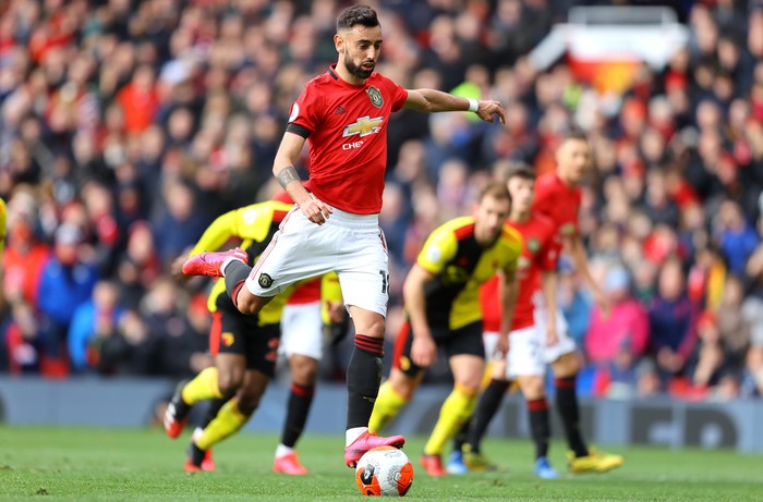 MANCHESTER, ENGLAND - FEBRUARY 23: Bruno Fernandes of Manchester United scores his teams first goal from a penalty during the Premier League match between Manchester United and Watford FC at Old Trafford on February 23, 2020 in Manchester, United Kingdom. (Photo by Richard Heathcote/Getty Images)