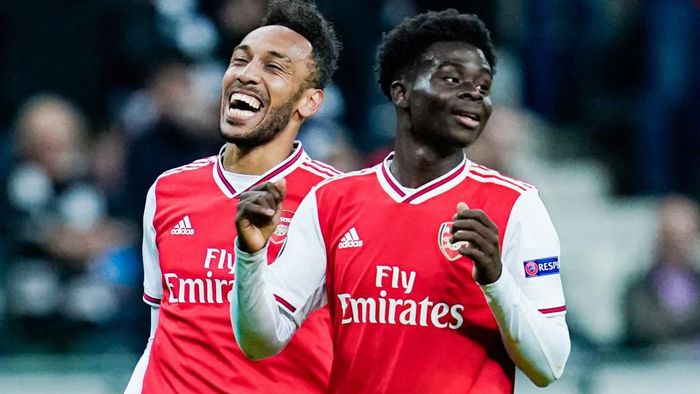 FBL-EUR-C3-FRANKFURT-ARSENAL Arsenals Gabonese striker Pierre-Emerick Aubameyang (L) and Arsenals forward Bukayo Saka celebrate scoring during the UEFA Europa League Group F football match Eintracht Frankfurt v Arsenal in Frankfurt am Main, western Germany, on September 19, 2019. (Photo by Uwe Anspach / dpa / AFP) / Germany OUT