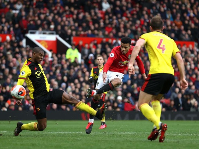 MANCHESTER, ENGLAND - FEBRUARY 23: Mason Greenwood of Manchester United scores his teams third goal during the Premier League match between Manchester United and Watford FC at Old Trafford on February 23, 2020 in Manchester, United Kingdom. (Photo by Clive Brunskill/Getty Images)