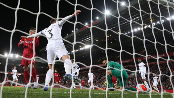 LIVERPOOL, ENGLAND - FEBRUARY 24: Mohamed Salah of Liverpool scores his sides second goal during the Premier League match between Liverpool FC and West Ham United at Anfield on February 24, 2020 in Liverpool, United Kingdom. (Photo by Clive Brunskill/Getty Images)