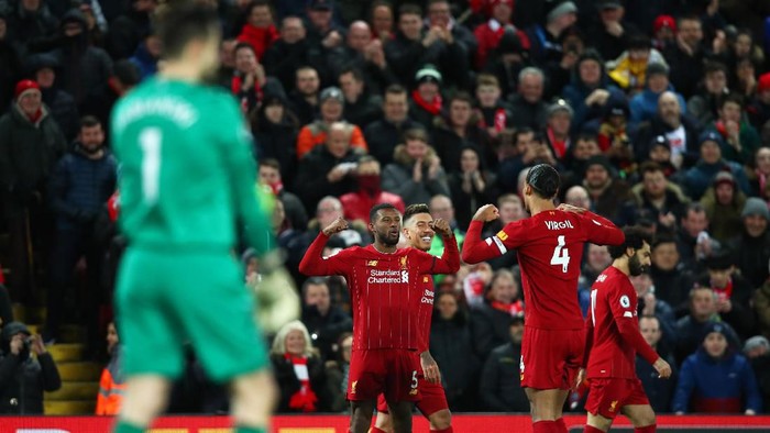 LIVERPOOL, ENGLAND - FEBRUARY 24: Georginio Wijnaldum of Liverpool celebrates after scoring his sides first goal during the Premier League match between Liverpool FC and West Ham United at Anfield on February 24, 2020 in Liverpool, United Kingdom. (Photo by Clive Brunskill/Getty Images)