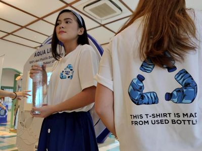 Kolaborasi Grab dan Aqua Kelola Sampah Plastik