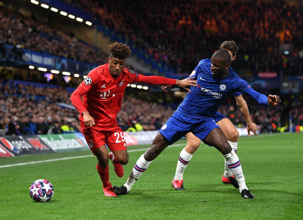 LONDON, ENGLAND - FEBRUARY 25: Kingsley Coman of Bayern Munich is closed down by Antonio Rudiger of Chelsea  during the UEFA Champions League round of 16 first leg match between Chelsea FC and FC Bayern Muenchen at Stamford Bridge on February 25, 2020 in London, United Kingdom. (Photo by Shaun Botterill/Getty Images)