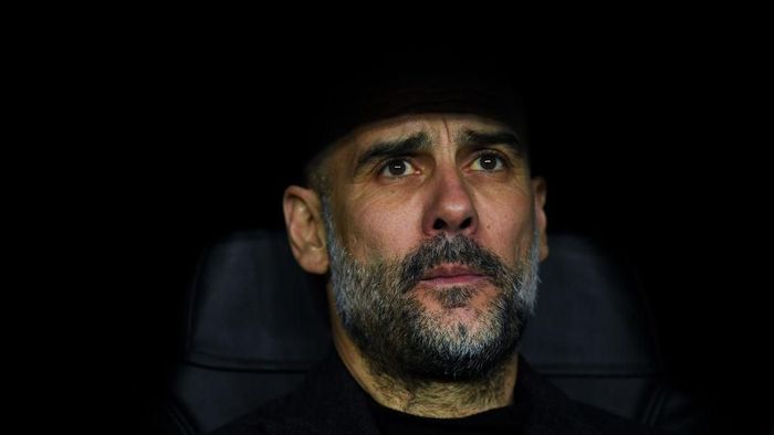 1208913599 MADRID, SPAIN - FEBRUARY 26: Josep Guardiola, manager of Manchester City FC looks on during the UEFA Champions League round of 16 first leg match between Real Madrid and Manchester City at Bernabeu on February 26, 2020 in Madrid, Spain. (Photo by David Ramos/Getty Images)