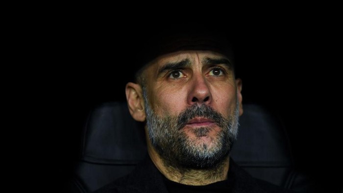 MADRID, SPAIN - FEBRUARY 26: Josep Guardiola, manager of Manchester City FC looks on during the UEFA Champions League round of 16 first leg match between Real Madrid and Manchester City at Bernabeu on February 26, 2020 in Madrid, Spain. (Photo by David Ramos/Getty Images)