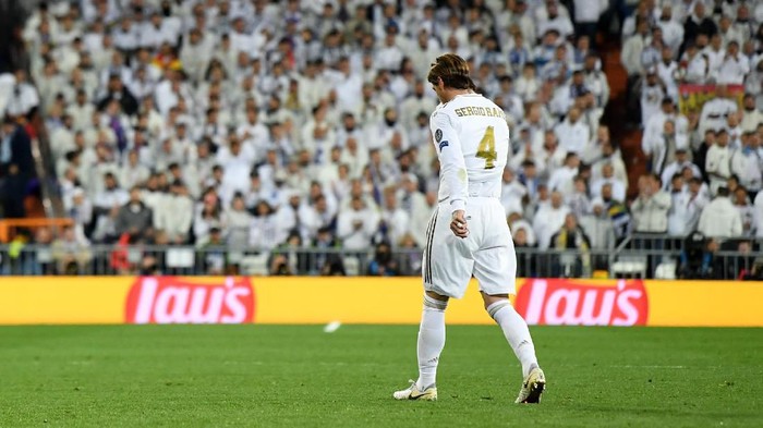 MADRID, SPAIN - FEBRUARY 26: Sergio Ramos of Real Madrid looks dejected as he leaves the pitch after receiving a red card during the UEFA Champions League round of 16 first leg match between Real Madrid and Manchester City at Bernabeu on February 26, 2020 in Madrid, Spain. (Photo by David Ramos/Getty Images)