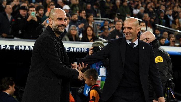 MADRID, SPAIN - FEBRUARY 26: Pep Guardiola, Manager of Manchester City shakes hands with Zinedine Zidane, Manager of Real Madrid prior to the UEFA Champions League round of 16 first leg match between Real Madrid and Manchester City at Bernabeu on February 26, 2020 in Madrid, Spain. (Photo by David Ramos/Getty Images)