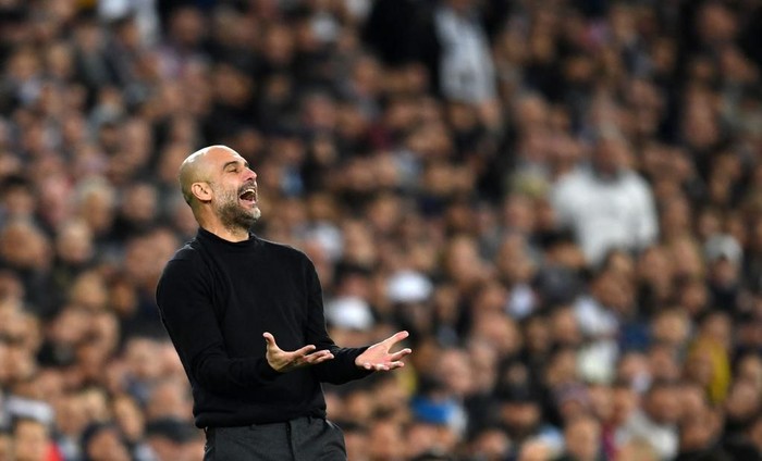 MADRID, SPAIN - FEBRUARY 26: Pep Guardiola, Manager of Manchester City reacts during the UEFA Champions League round of 16 first leg match between Real Madrid and Manchester City at Bernabeu on February 26, 2020 in Madrid, Spain. (Photo by David Ramos/Getty Images)