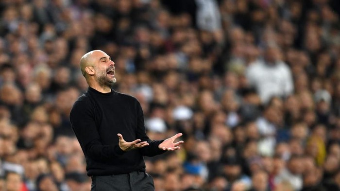 MADRID, SPAIN - FEBRUARY 26: Pep Guardiola, Manager of Manchester City reacts during the UEFA Champions League round of 16 first leg match between Real Madrid and Manchester City at Bernabeu on February 26, 2020 in Madrid, Spain. (Photo by David Ramos/Getty Images)