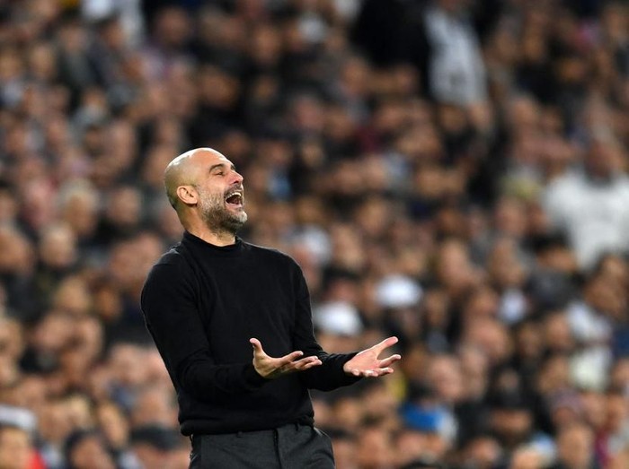 MADRID, SPAIN - FEBRUARY 26: Pep Guardiola, Manager of Manchester City reacts during the UEFA Champions League round of 16 first leg match between Real Madrid and Manchester City at Bernabeu on February 26, 2020 in Madrid, Spain. (Photo by David Ramos/Getty Images)