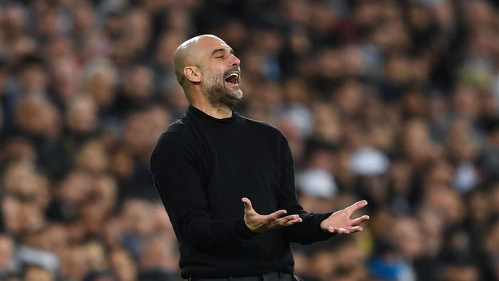 Josep Guardiola MADRID, SPAIN - FEBRUARY 26: Josep Guardiola, manager of Manchester City FC reacts during the UEFA Champions League round of 16 first leg match between Real Madrid and Manchester City at Bernabeu on February 26, 2020 in Madrid, Spain. (Photo by David Ramos/Getty Images)