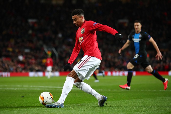 MANCHESTER, ENGLAND - FEBRUARY 27: Jesse Lingard of Manchester United crosses the ball in the box to Fred of Manchester United (not pictured) for him to score their sides fourth goal during the UEFA Europa League round of 32 second leg match between Manchester United and Club Brugge at Old Trafford on February 27, 2020 in Manchester, United Kingdom. (Photo by Clive Brunskill/Getty Images)