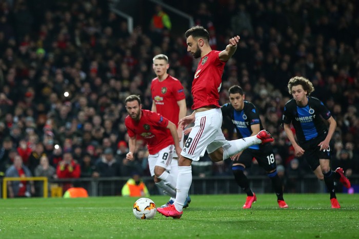 MANCHESTER, ENGLAND - FEBRUARY 27: Bruno Fernandes of Manchester United scores his teams first goal from the penalty spot during the UEFA Europa League round of 32 second leg match between Manchester United and Club Brugge at Old Trafford on February 27, 2020 in Manchester, United Kingdom. (Photo by Clive Brunskill/Getty Images)