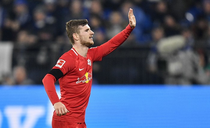 Leipzigs Timo Werner celebrates after scoring his sides second goal during the German Bundesliga soccer match between FC Schalke 04 and RB Leipzig at the arena in Gelsenkirchen, Germany, Saturday, Feb. 22, 2020. (AP Photo/Martin Meissner)