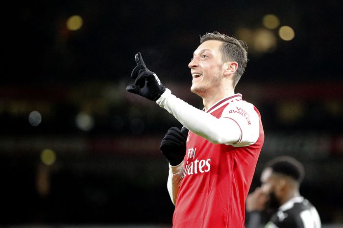 Mesut Oezil Arsenals Mesut Ozil celebrates after scoring his sides third goal during the English Premier League soccer match between Arsenal and Newcastle at the Emirates Stadium in London, Sunday, Feb. 16, 2020.(AP Photo/Frank Augstein)