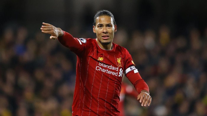 WATFORD, ENGLAND - FEBRUARY 29: Virgil van Dijk of Liverpool signals to a team mate during the Premier League match between Watford FC and Liverpool FC at Vicarage Road on February 29, 2020 in Watford, United Kingdom. (Photo by Richard Heathcote/Getty Images)