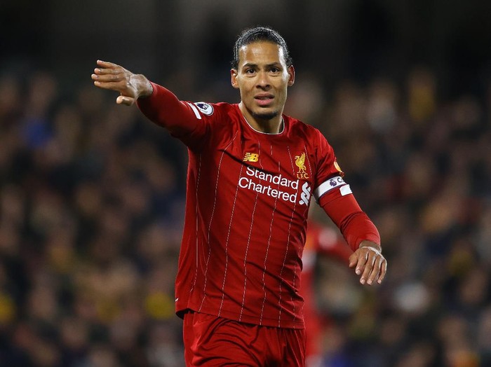 WATFORD, ENGLAND - FEBRUARY 29: Virgil van Dijk of Liverpool signals to a team mate during the Premier League match between Watford FC and Liverpool FC at Vicarage Road on February 29, 2020 in Watford, United Kingdom. (Photo by Richard Heathcote/Getty Images)