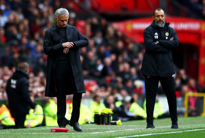MANCHESTER, ENGLAND - SEPTEMBER 22:  Jose Mourinho, Manager of Manchester United checks his watch during the Premier League match between Manchester United and Wolverhampton Wanderers at Old Trafford on September 22, 2018 in Manchester, United Kingdom.  (Photo by Matthew Lewis/Getty Images)