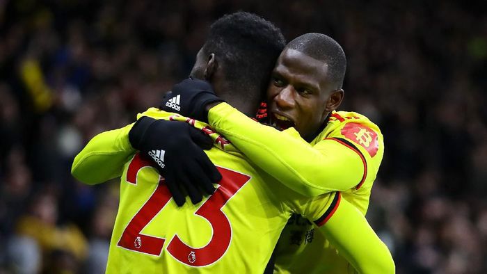 Watford vs Liverpool WATFORD, ENGLAND - FEBRUARY 29: Ismaila Sarr of Watford celebrates after scoring his teams first goal with teammate Abdoulaye Doucoure during the Premier League match between Watford FC and Liverpool FC at Vicarage Road on February 29, 2020 in Watford, United Kingdom. (Photo by Richard Heathcote/Getty Images)