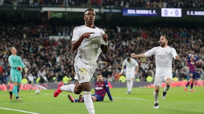 Vinicius Junior Real Madrid MADRID, SPAIN - MARCH 01: Vinicius Junior of Real Madrid celebrates after scoring his teams first goal during the Liga match between Real Madrid CF and FC Barcelona at Estadio Santiago Bernabeu on March 01, 2020 in Madrid, Spain. (Photo by Gonzalo Arroyo Moreno/Getty Images)