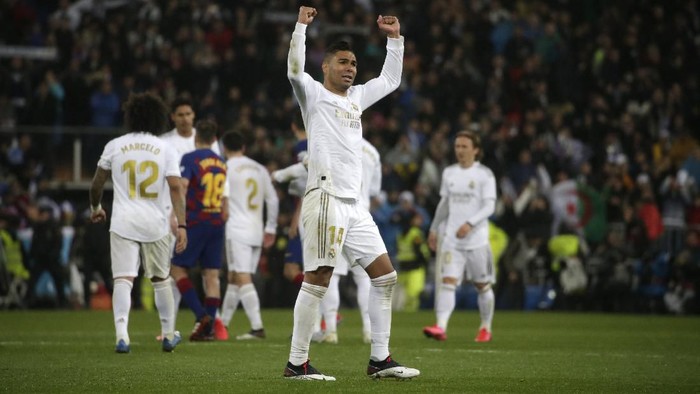 Real Madrids Casemiro celebrates after the Spanish La Liga soccer match between Real Madrid and Barcelona at the Santiago Bernabeu stadium in Madrid, Spain, Sunday, March 1, 2020. Real won the match 2-0. (AP Photo/Andrea Comas)