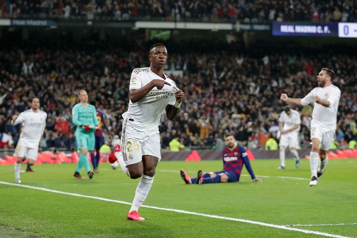 MADRID, SPAIN - MARCH 01: Vinicius Junior of Real Madrid celebrates after scoring his teams first goal during the Liga match between Real Madrid CF and FC Barcelona at Estadio Santiago Bernabeu on March 01, 2020 in Madrid, Spain. (Photo by Gonzalo Arroyo Moreno/Getty Images)